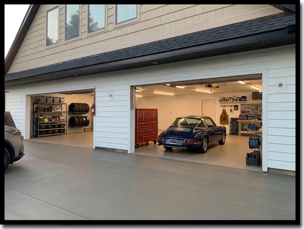 Finished Poly-Quartz garage floor coating in a high-end Twin Cities home, showcasing the 125-mil thick, no-slip 'suit of armor' finish by Concrete Renewal that provides a superior 0.80 Wet DCOF for maximum safety and durability.