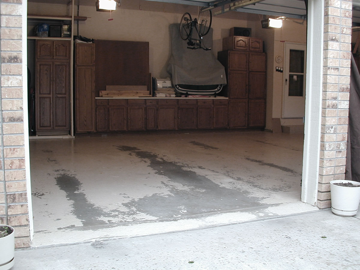 Worn out garage floor before